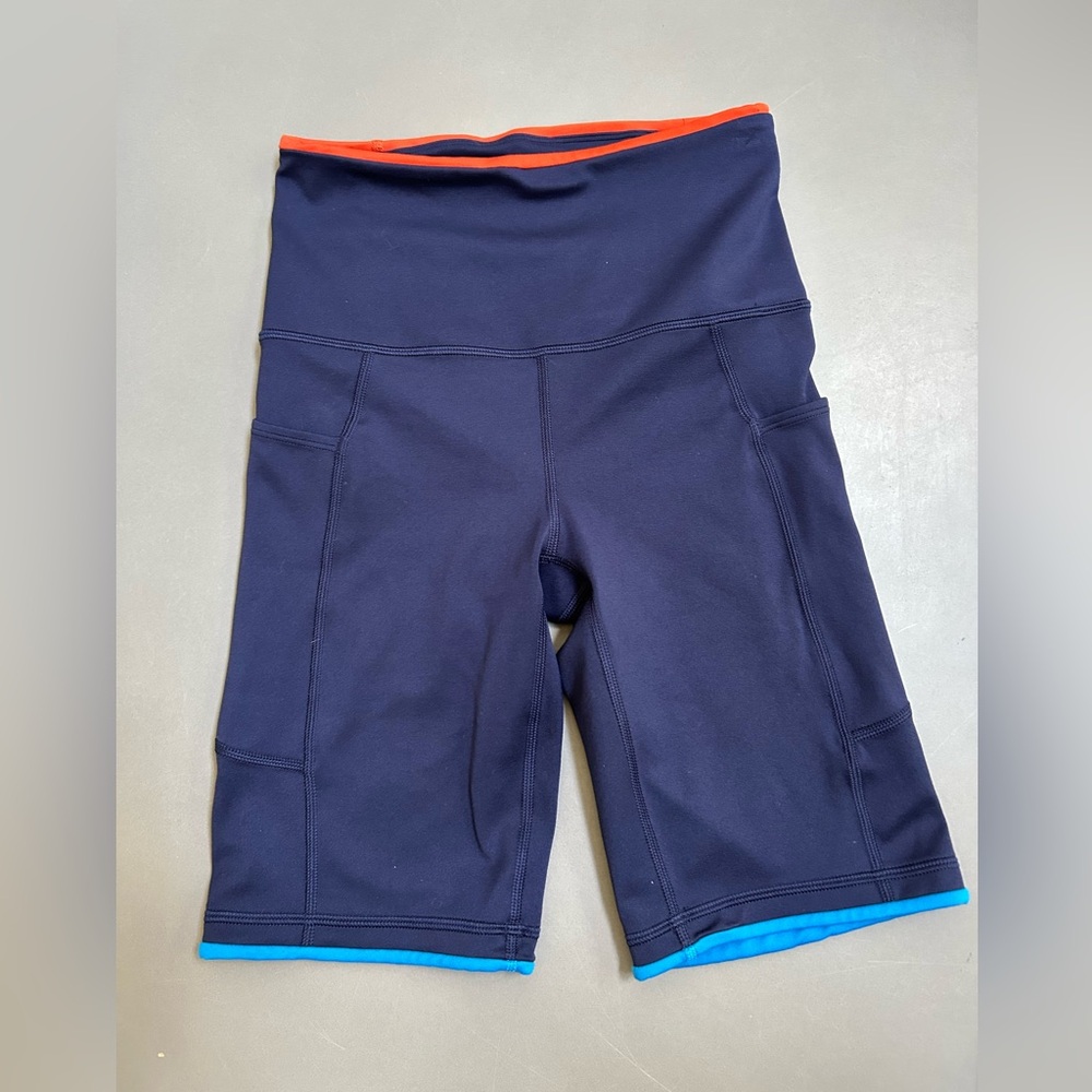 Cotopaxi Blue and Orange Bike Shorts Performance Fit